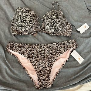 Shade and shore bikini.  Cheetah print. Size 36D and bottom is Large.
